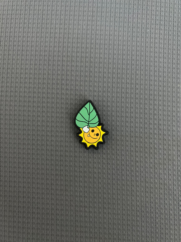 خورشید بامزه با برگ